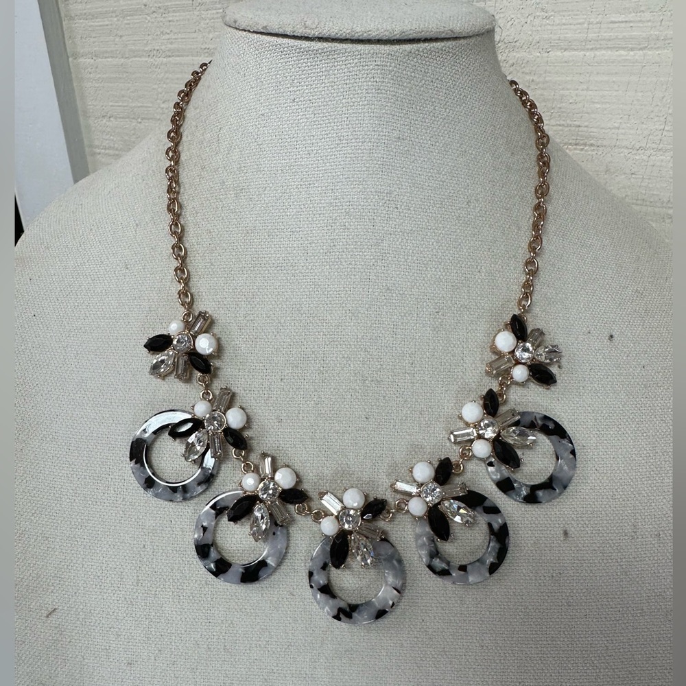 Sparkly goldtone and black accents statement necklace